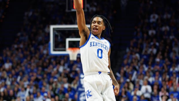 Jan 31, 2024; Lexington, Kentucky, USA; Kentucky Wildcats guard Rob Dillingham (0) makes a three point basket during the second half against the Florida Gators at Rupp Arena at Central Bank Center. Mandatory Credit: Jordan Prather-USA TODAY Sports
